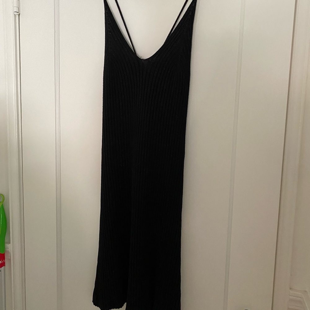 Black Dress Criss Cross Back Sweater Material of Acrylic,Cotton,Nylon Metallic.
